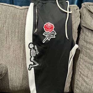 Black and white striped reasons pants